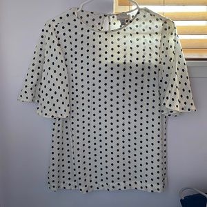 Cream color blouse with flutter sleeves